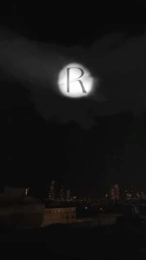 Laser Text Projection in the Sky in a fake-out-of-home ad of Reis
