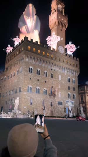 Giant Hologram on Palazzo Vecchio in a fake-out-of-home ad of Russ