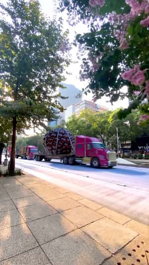 Giant Bottle Delivery in fake-out-of-home ad of Johnnie Walker