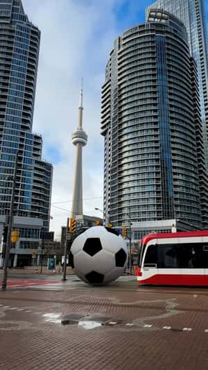Giant Soccer Ball Rolls Through Toronto in a fake-out-of-home ad of TTC