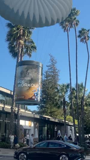 Giant Containers Land on Erewhon in a fake-out-of-home ad of Antidote Pre-Workout 