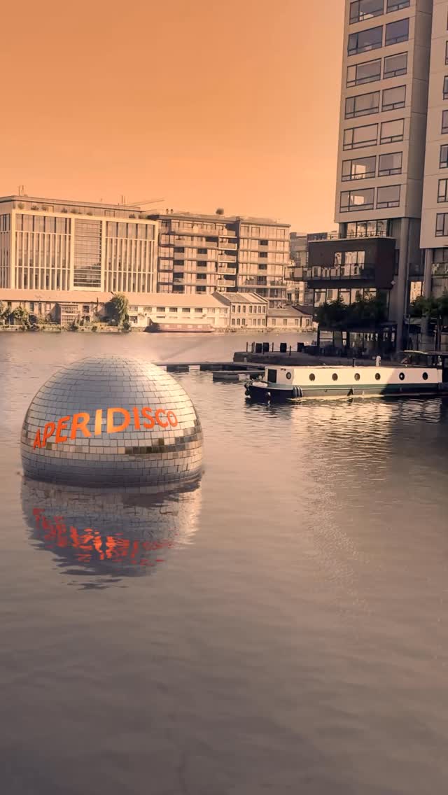 Giant Disco Ball Floats in River in a fake-out-of-home ad of Aperol Spritz
