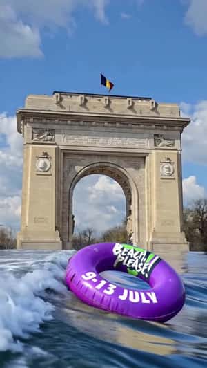 Wave Crashes Arcul de Triumf in a fake-out-of-home ad of Beach, Please! Festival