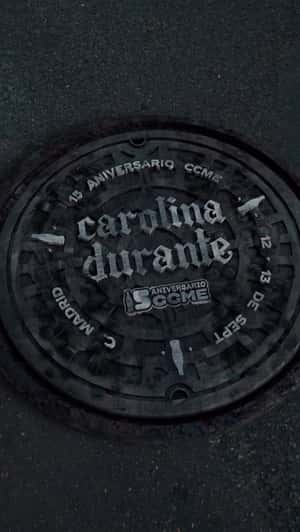Carolina Durante Manhole Cover in a fake-out-of-home ad of Coca-cola