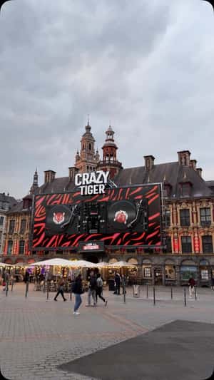 Giant DJ Mixing Console at Grand'Place in a fake-out-of-home ad of Crazy Tiger