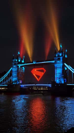 Giant Superman Emblem on Tower Bridge in a fake-out-of-home ad of DC