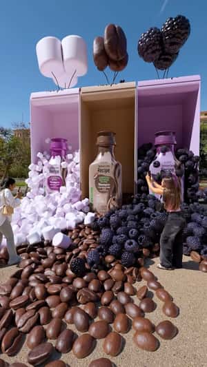 Giant Shampoo Bottles Land on Street in a fake-out-of-home ad of Eva Recipe