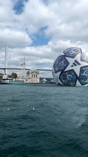 Giant Floating Soccer Ball in fake-out-of-home ad of Adidas