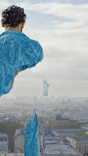 Giant "Fragmented Traveler" Comes to Life in a fake-out-of-home ad of Galeries Bartoux