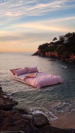 Bed Floats on Water in a fake-out-of-home ad of Hommey