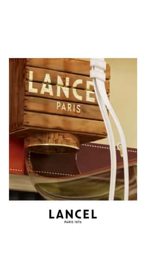 Giant Fruits Fall into Giant Handbag in a fake-out-of-home ad of Lancel