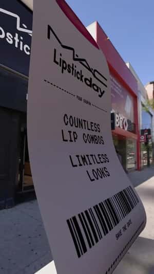 Massive Receipt Prints on Facade in a fake-out-of-home ad of MAC Cosmetics