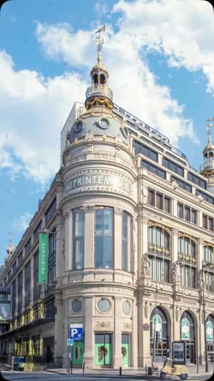 Giant Shopping Bag Emerges from Printemps in a fake-out-of-home ad of Malina