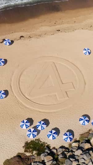 Fantastic Four Logo Etched in Sand in a fake-out-of-home ad of Marvel Studios