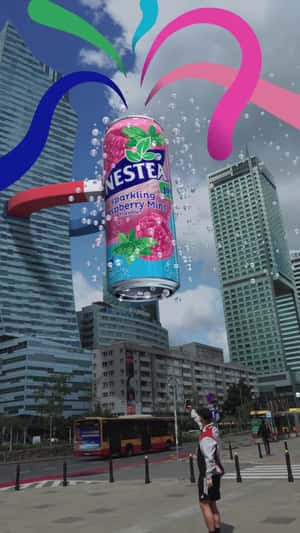 Giant Can Attaches to Giant Magnet in a fake-out-of-home ad of Nestea