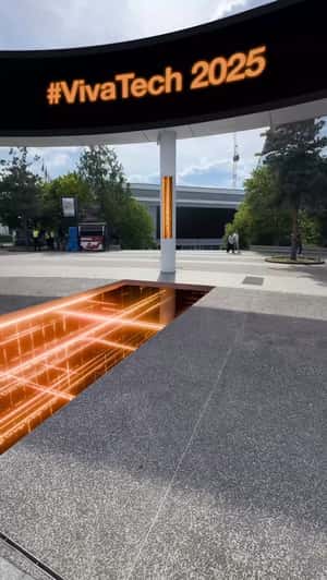 Portal Opens from Pavement in a fake-out-of-home ad of Orange