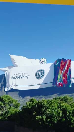 Massive Bed on Table Mountain in a fake-out-of-home ad of Orlando Pirates Football Club