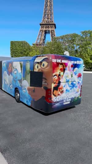 Smurfs Bus Pass by Eiffel Tower in a fake-out-of-home of Paramount Pictures 
