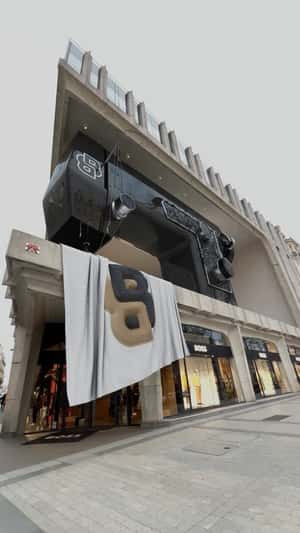 Huge Double B Sewing Machine fake out of home ad of BOSS