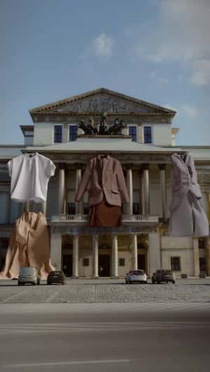 Giant Business Suit Packed in Floating Package in a fake-out-of-home ad of Plethora 