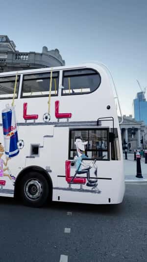 Animated Design on Double-Decker Bus in a fake-out-of-home ad of Red Bull 