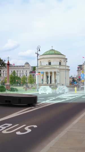Giant Vacuum Cleans Warsaw Streets in a fake-out-of-home ad of Roborock