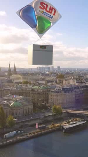 Giant Dishwasher Engulfs Arc de Triomphe in a fake-out-of-home ad of Sun