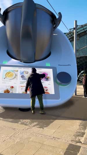 Giant Smoothies Arrive by Train in a fake-out-of-home ad of Thermomix