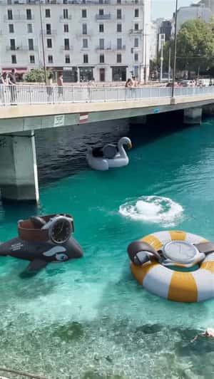 Giant Watches on Floats in a fake-out-of-home ad of Watches and Wonders 