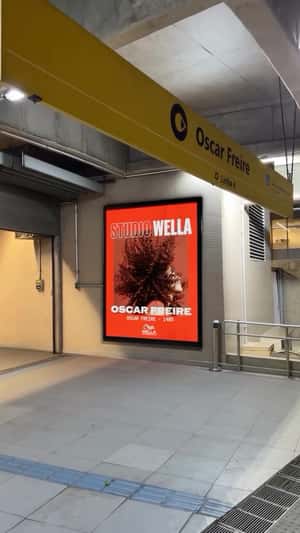 Red Billboards on São Paulo Buildings in a fake-out-of-home ad of Wella Professionals 