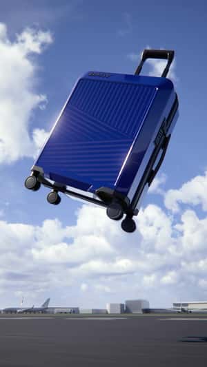 Blue Suitcase Takes Flight in a fake-out-of-home ad of BMW