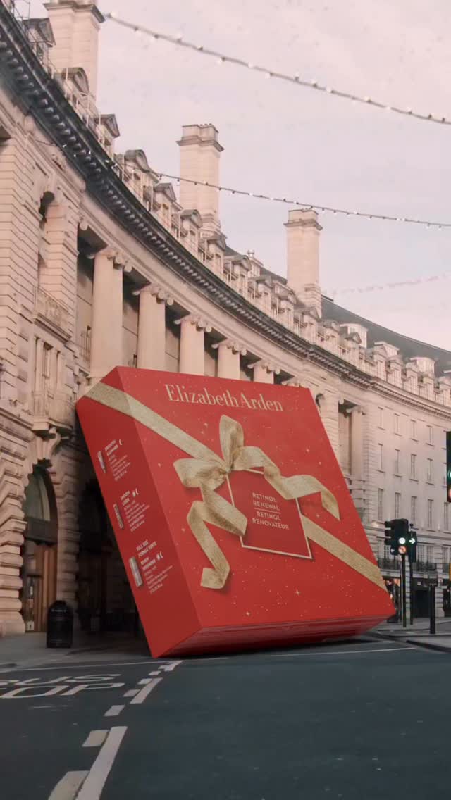 Giant Holiday Gift Set Unboxing in a fake-out-of-home ad of Elizabeth Arden 