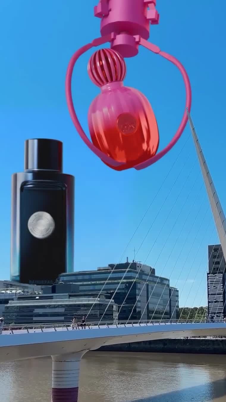 Giant Claw Drops Giant Bottle in a fake-out-of-home ad of Banderas Perfumes 