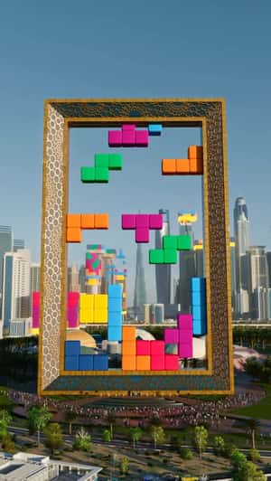 Tetris Blocks Fall on Dubai Skyline in a fake-out-of-home ad of Red Bull 