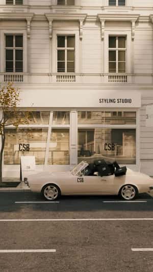 Boxes Ride in Convertible in a fake-out-of-home ad of Crop Shop Boutique 