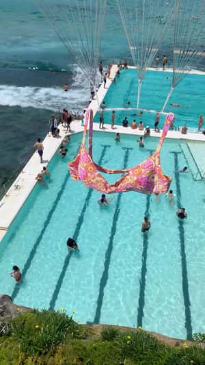 Bikinis Parachute Landing in fake-out-of-home ad of Kulani Kinis