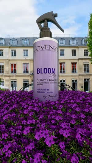 Purple Flowers Sweep Paris in a fake-out-of-home ad of L’ovenze Professional 