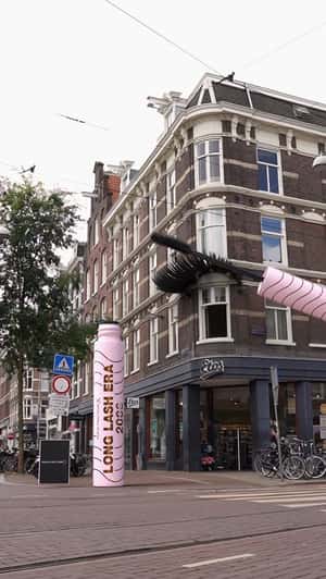 Giant Mascara Wand Paints Lashes in a fake-out-of-home ad of Max Factor 
