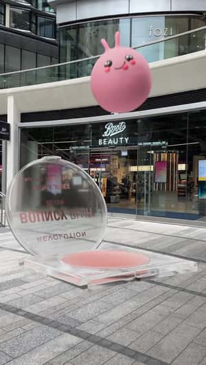 Giant Blush Bounces on Compact in a fake-out-of-home ad of Revolution
