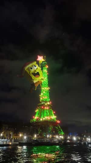 SpongeBob Tops Eiffel Tower in a fake-out-of-home ad of Paramount Pictures