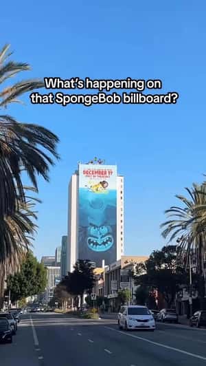 Characters Atop Building in a fake-out-of-home ad of The SpongeBob Movie