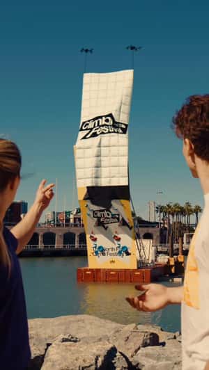 Drones Unveil Rock Climbing Wall in a fake-out-of-home ad of The North Face 