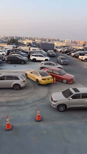BMW Cars Drift in Parking Lot in a fake-out-of-home ad of Automax 