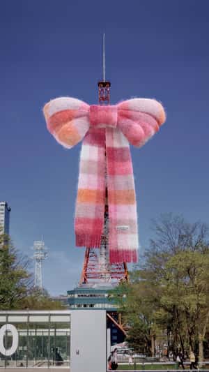 Giant Ribbon Scarf in fake-out-of-home ad of Acne Studios