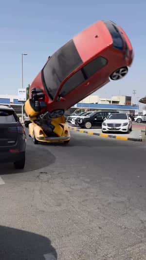 Robotic Arm Throws Car in a fake-out-of-home ad of Automax 
