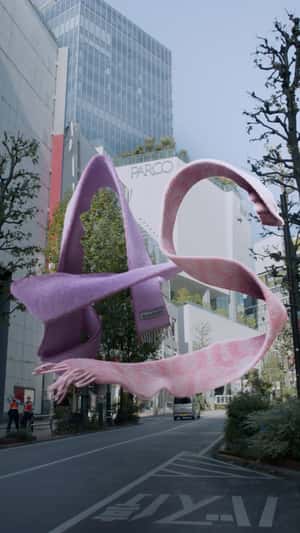 Scarves Forming Letters in fake-out-of-home ad of Acne Studios