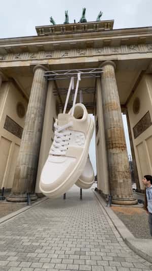 Giant Double B sneakers fake out of home ad of BOSS