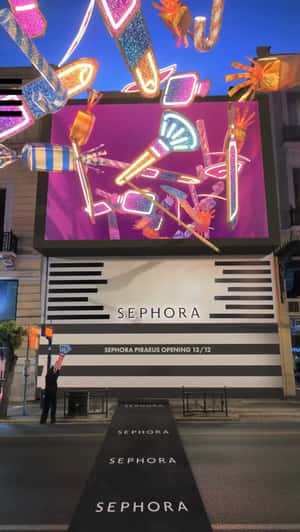 Beauty Items Emerge from Facade in a fake-out-of-home ad of Sephora