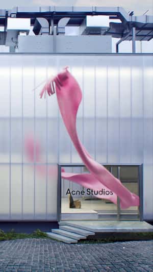 Pink Scarf Forms Giant Ribbon in fake-out-of-home ad of Acne Studios