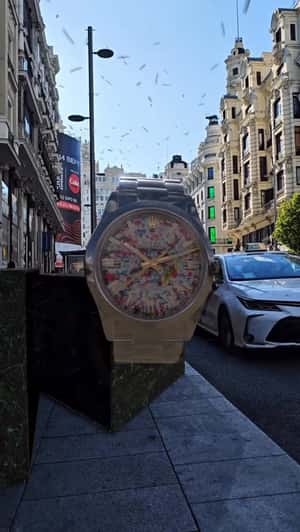 Giant Watch Pops Out of Black Box in a fake-out-of-home ad of MilfShakes